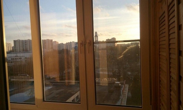 Окна квартиры с видом на город